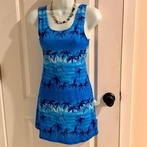 Blue Palm Tree Print Dress or coverup. Made of polyester and Lycra size S